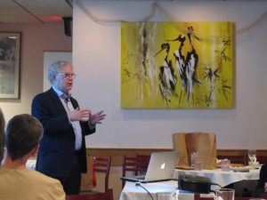 Alan Grossman in front of an audience.