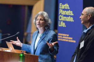 Susan Solomon takes questions after her lecture while Professor Dan Rothman looks on.