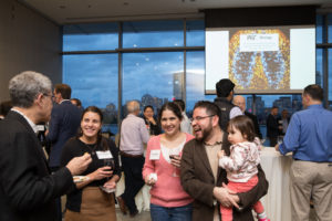 several people chatting at a social gathering