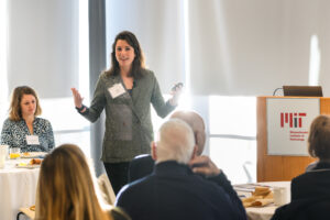 Photo of Erin Kara presenting to an audience