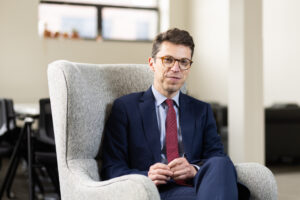 Nuno Loureiro sitting in a chair