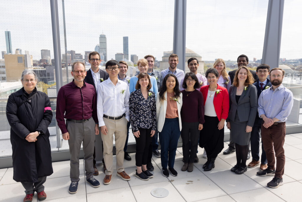 group photo of Infinite Mile and Expansion award winners on the balcony of the MIT Schwarzman College of Computing