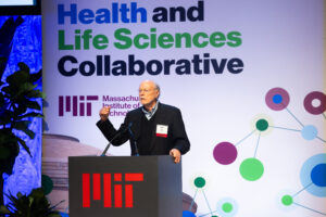 Phillip Sharp delivers keynote at MIT podium