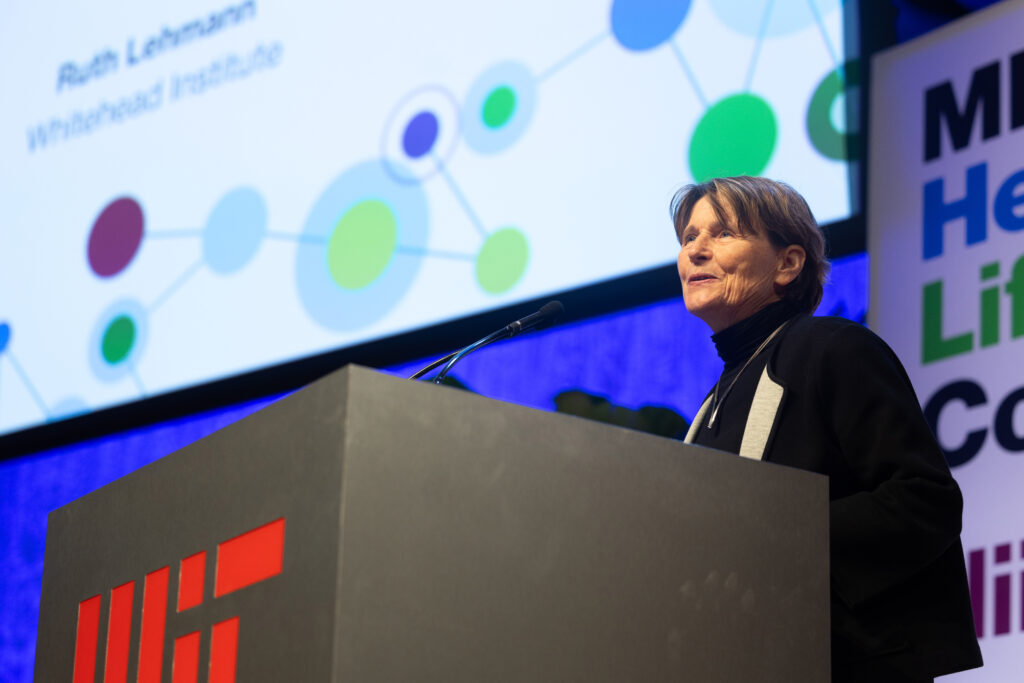 Ruth Lehmann at an MIT podium