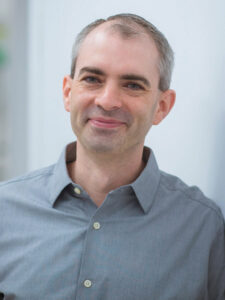 Headshot of Iain Cheeseman